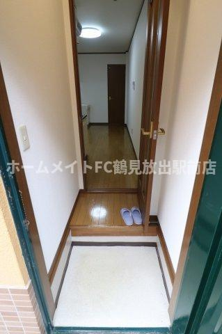 大阪市鶴見区放出東１丁目の賃貸マンションの玄関