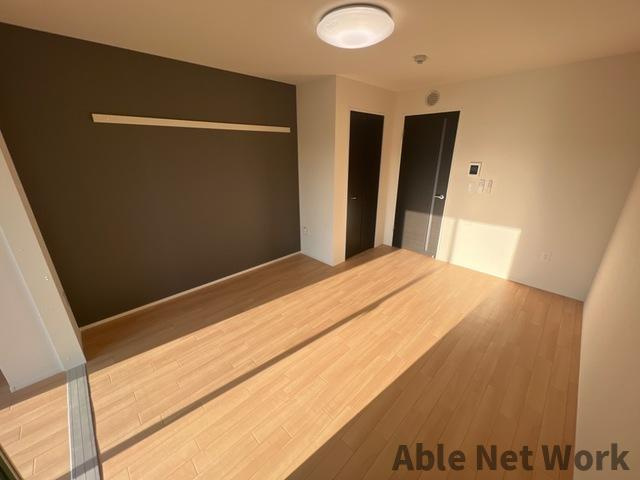 ユメグラン・ハッピネトゥーモの居間・リビング|8.4帖洋室