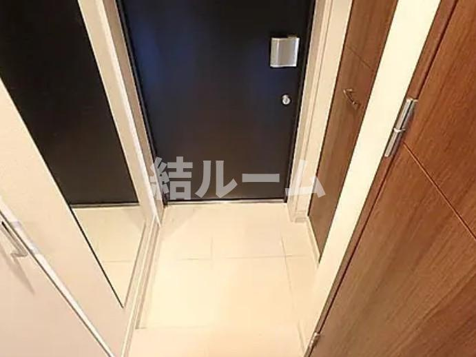 北区王子本町１丁目の賃貸マンションの玄関