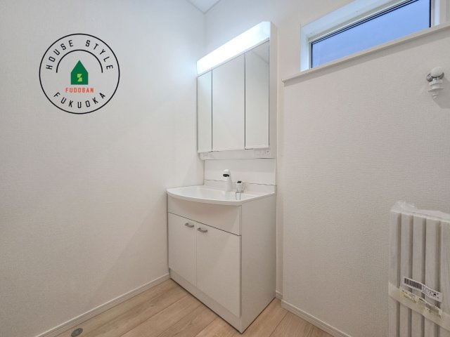 大野城市山田2丁目第5-1棟（1号棟）の内観：施工例|洗面所は小さなプライベートスペース。歯磨き、洗顔と毎日施す個人空間。