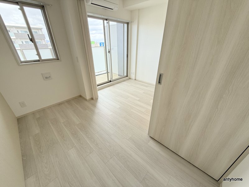 プレサンス東淀川駅前プローシェ　仲介手数料無料の寝室