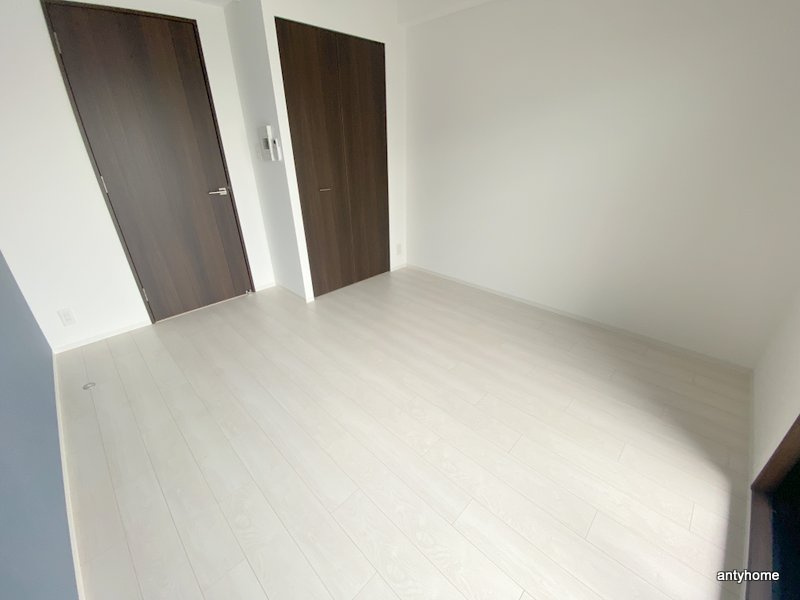 ワールドアイ大阪城EASTⅡ 仲介手数料無料の居間・リビング