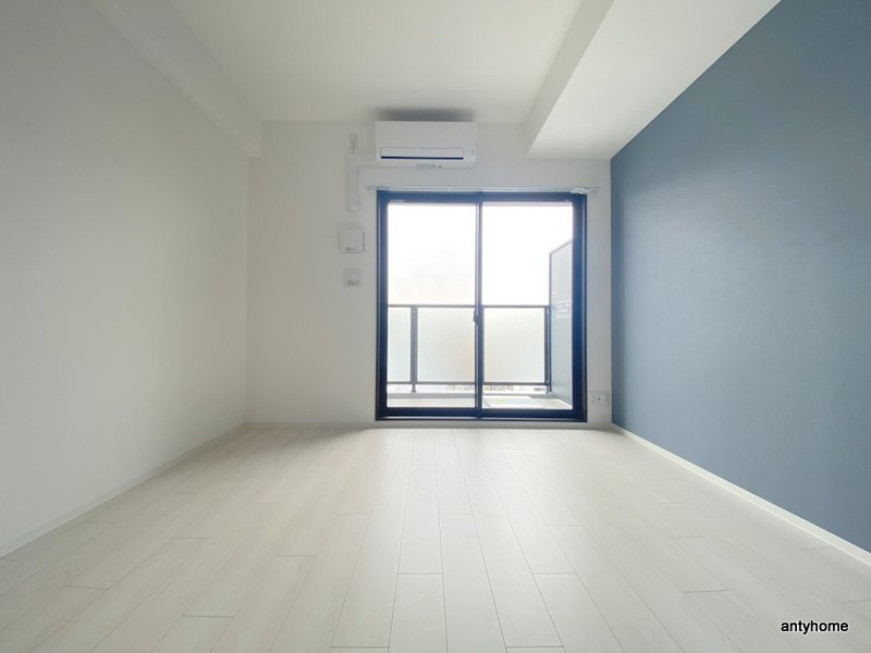 ワールドアイ大阪城EASTⅡ 仲介手数料無料の居間・リビング