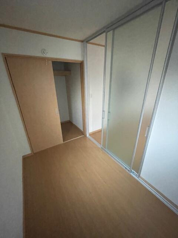 川崎市多摩区中野島１丁目のアパートの寝室