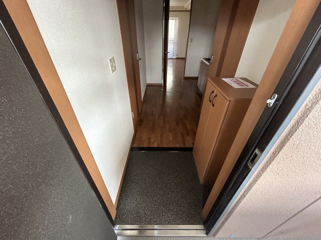 コンフォール白水の玄関