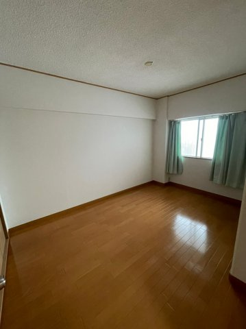 メゾン茨木西駅前の寝室