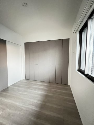 エンクレスト博多PARKSIDEの寝室