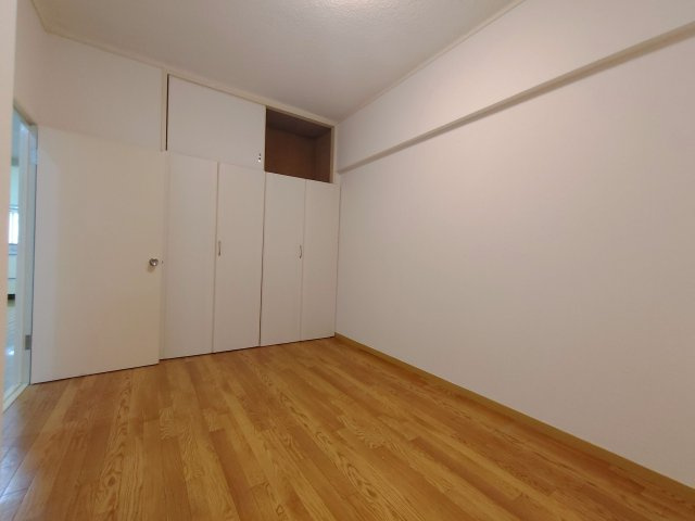 メゾン茨木西駅前の寝室