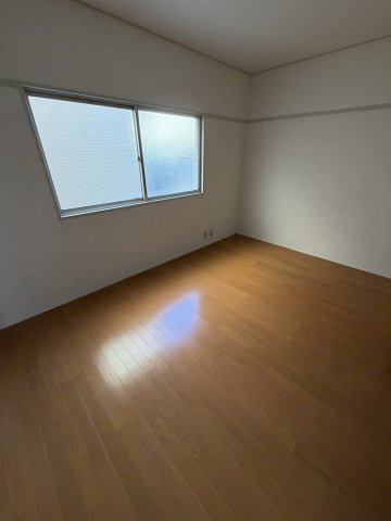 荒第４湊川マンションの寝室