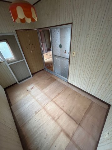 池田広町貸家の寝室