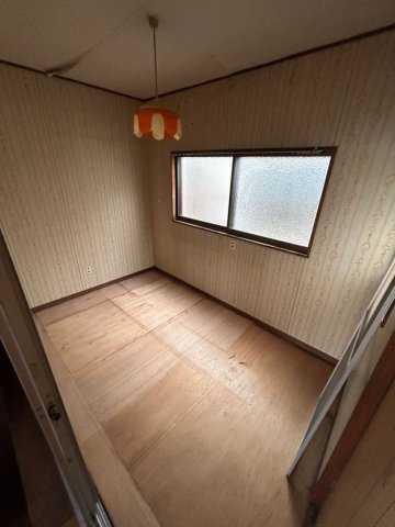 池田広町貸家の寝室