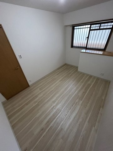 KUSABAマンションの寝室