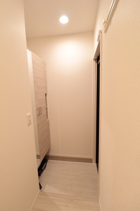 Ｄアセット飛田給の玄関