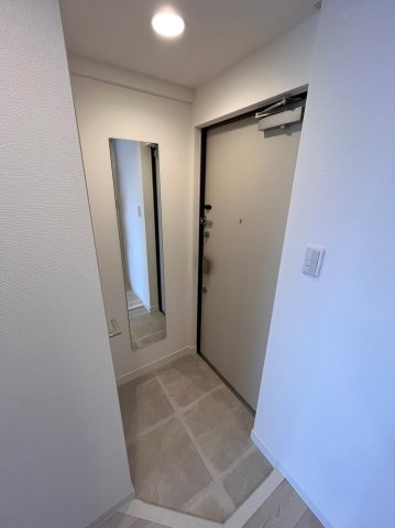 大阪市中央区上本町西４丁目の賃貸マンションの玄関