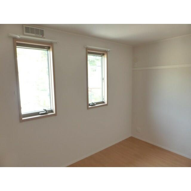 町田市三輪町のアパートの寝室