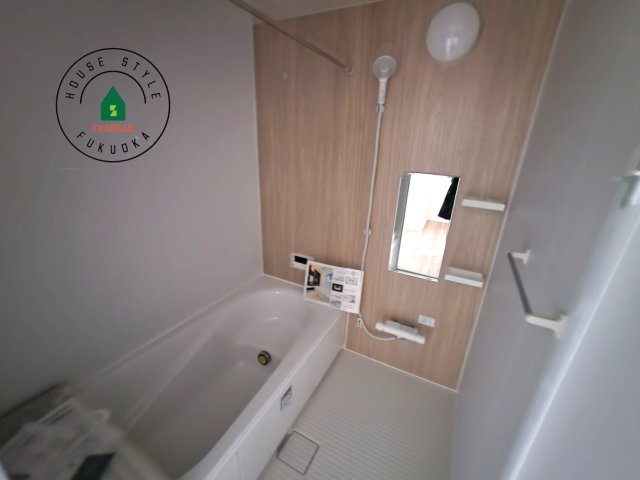 糸島市前原北４丁目第3-1棟（1号棟）の内観：施工例|1日の疲れを癒してくれる広々バスルーム。雨の日のお洗濯にも大活躍な浴室乾燥機付です！