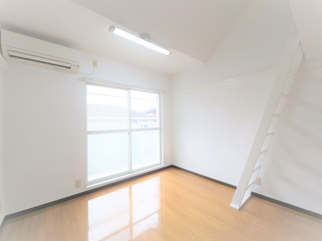コーポ太陽　津島の居間・リビング|※写真は別の部屋のものです。