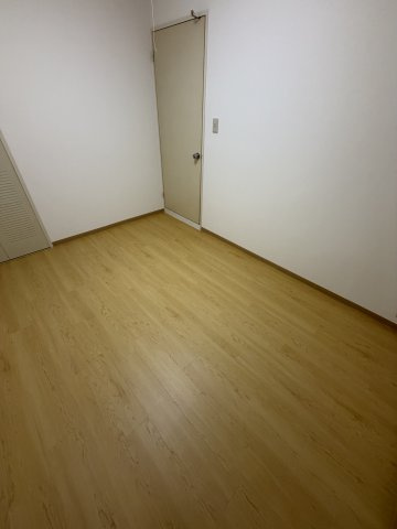 コープ野村高取台の洋室