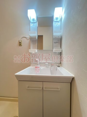 カンフォート東合川の洗面所