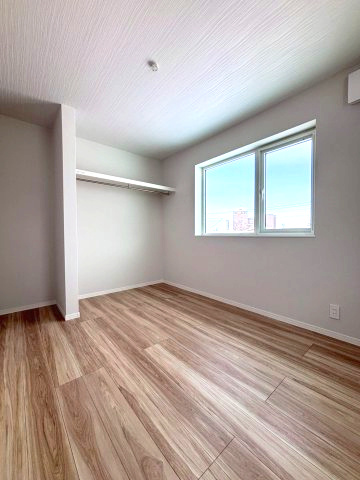 江別市文京台5-19の洋室