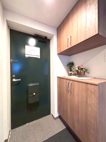 コープ野村幌西の玄関