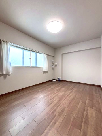 コープ野村幌西の洋室