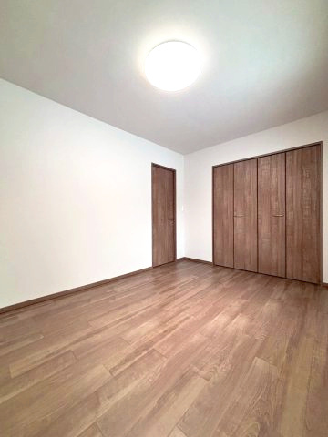 コープ野村幌西の洋室