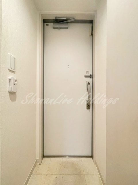 リブリ・プモリⅠの玄関|「同施工別建物」