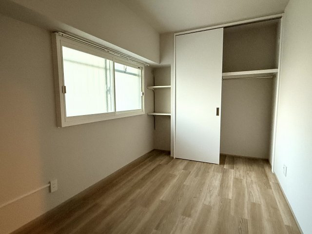 YKハイツ中崎の寝室