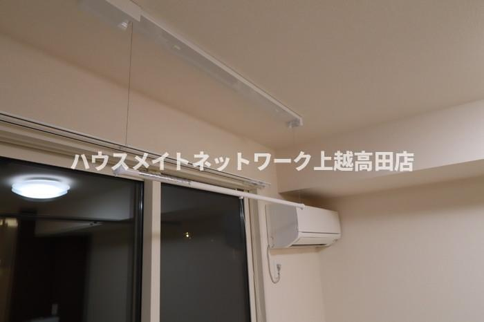 ヴィンヤードの展望|室内物干し（間取り反転タイプ103号室参考画像となります。）
