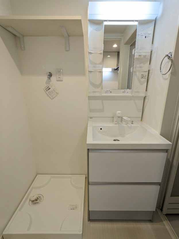 ハーモニーテラス鶴田Ⅱの洗面所|102号室