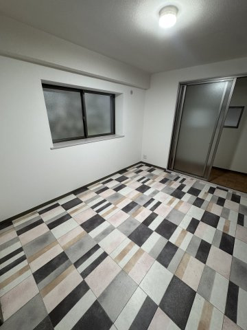鶯橋マンションの寝室