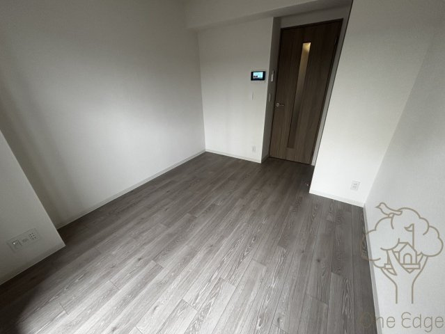 プランドール新北野の寝室