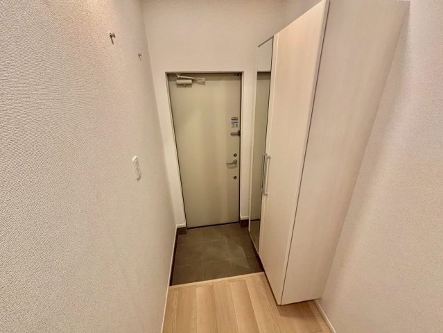 サクラ・コート阿成の玄関