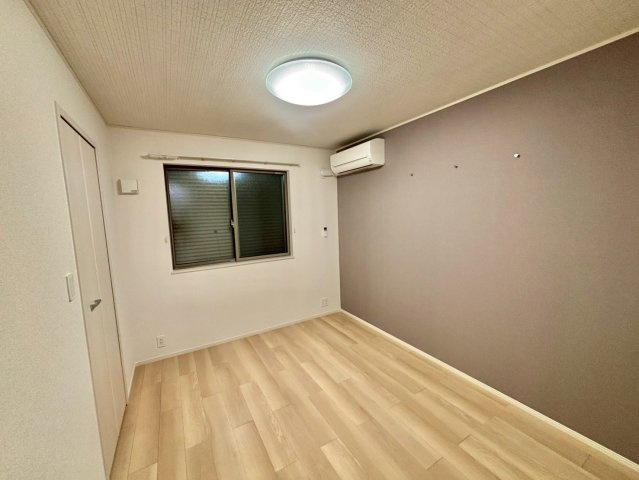 サクラ・コート阿成の洋室