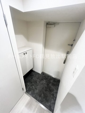大阪市鶴見区諸口１丁目の賃貸マンションの玄関