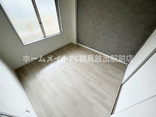 東大阪市稲田上町１丁目の賃貸マンションの洋室