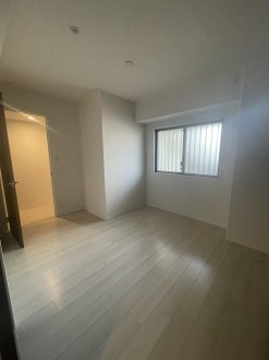 アルファスマート西川緑道公園の洋室