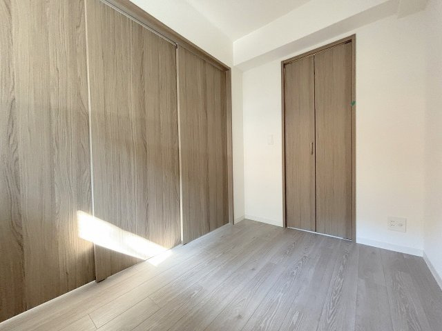 プランドール新北野の洋室