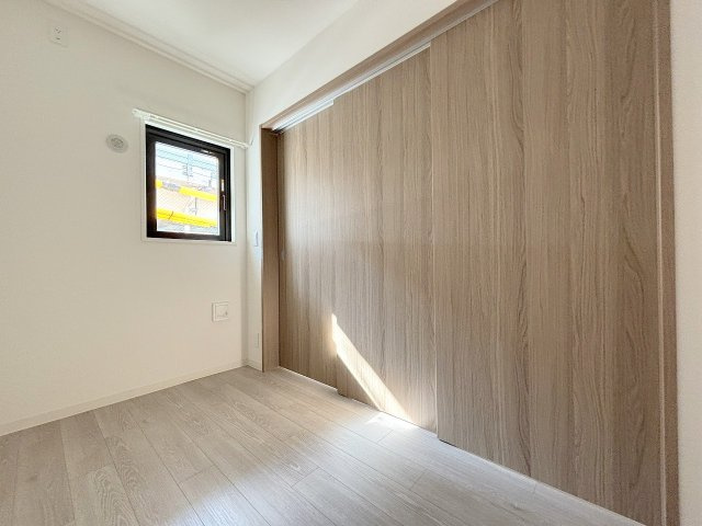 プランドール新北野の洋室