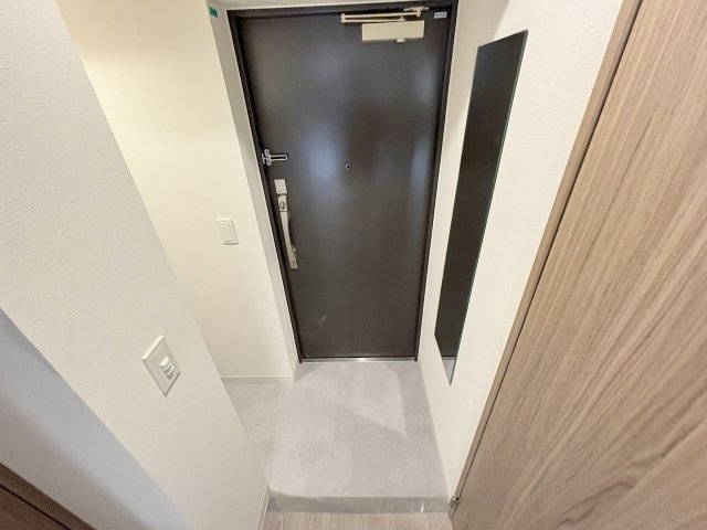 プランドール新北野の玄関