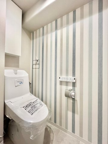 ネオコーポ鶴橋のトイレ|落ち着いた色調のトイレです