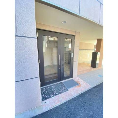 メゾン柿の木のエントランス