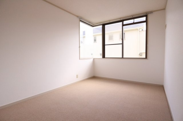 ロイヤルハイツ本多聞の寝室