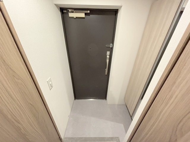 プランドール新北野の玄関