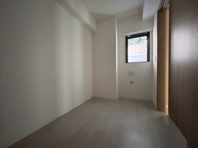 プランドール新北野の洋室