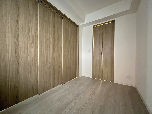 プランドール新北野の洋室