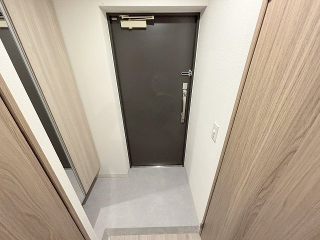 プランドール新北野の玄関