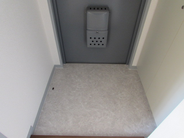 大仲売布メゾンドムールの玄関