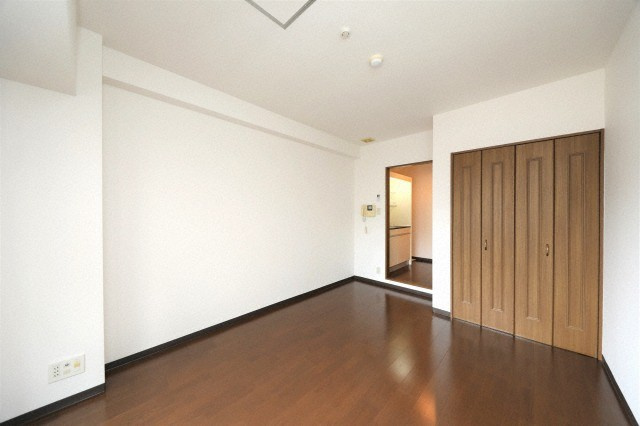 ロイヤルクイーンズパークの洋室